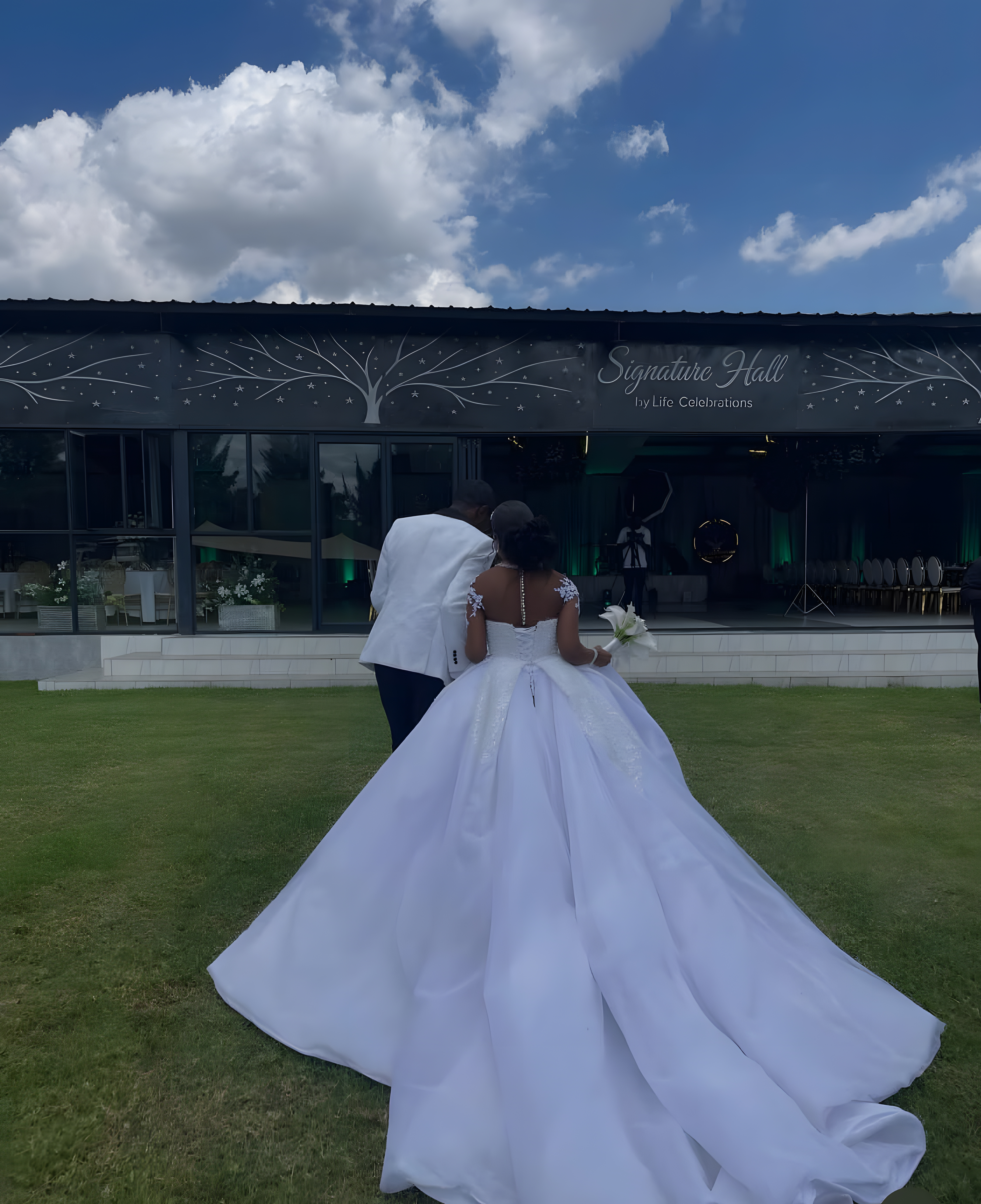 Signature Hall — couple at entrance