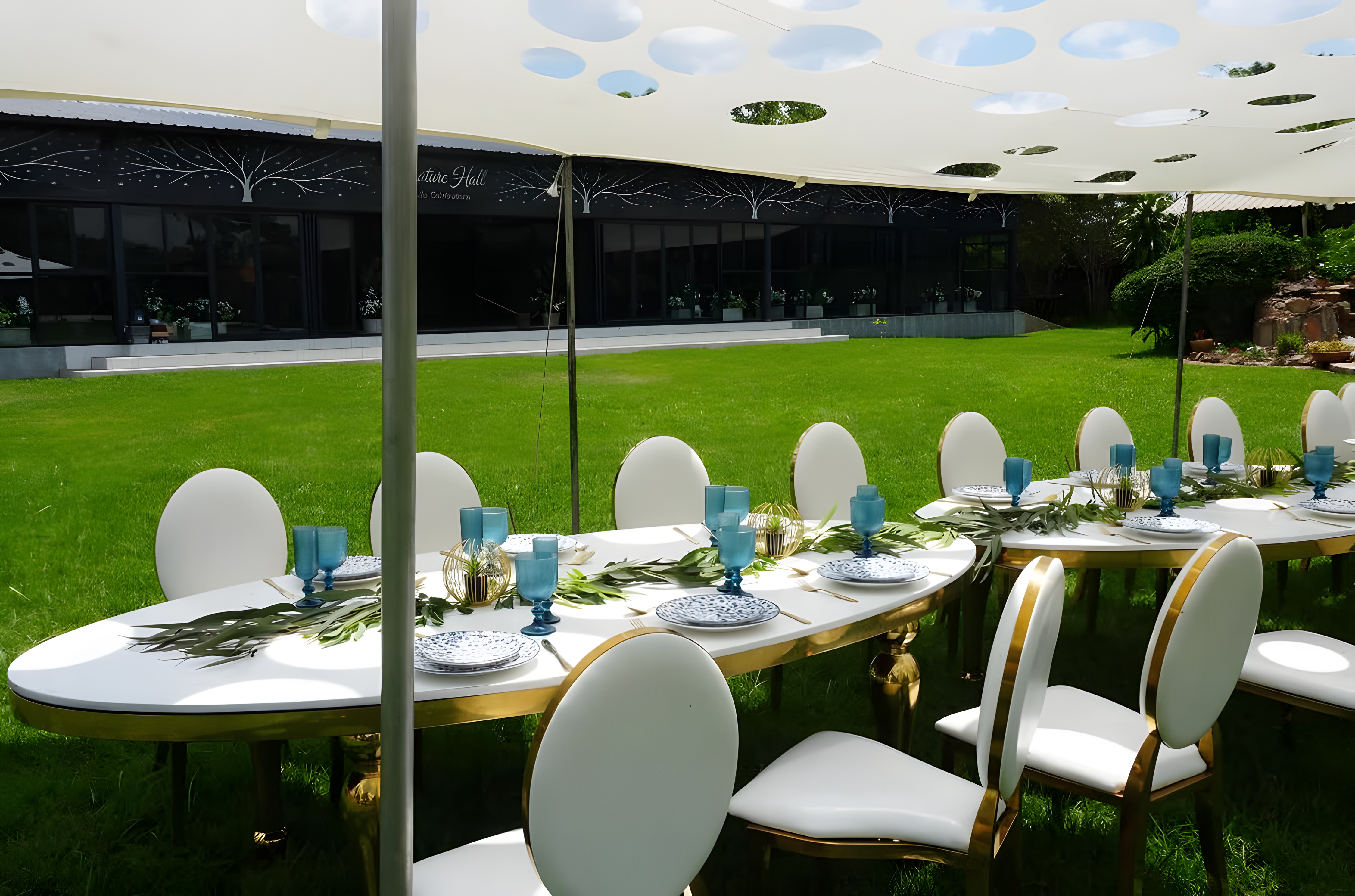 The Garden — white roses and gold table setting